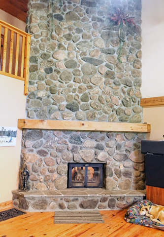 Stone fireplace in Living room